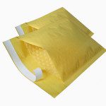 Yellow Colored Jiffy Padded Bubble Envelope sealed with permanent bag sealing tape