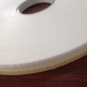 Bag Sealing Tape with adhesive coated in the center on the liner.