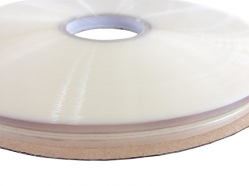 Bag Sealing Tape with adhesive in the center of the liner,applicated to manufacture self seal poly packaging bags.